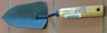 rotated small wood trowel